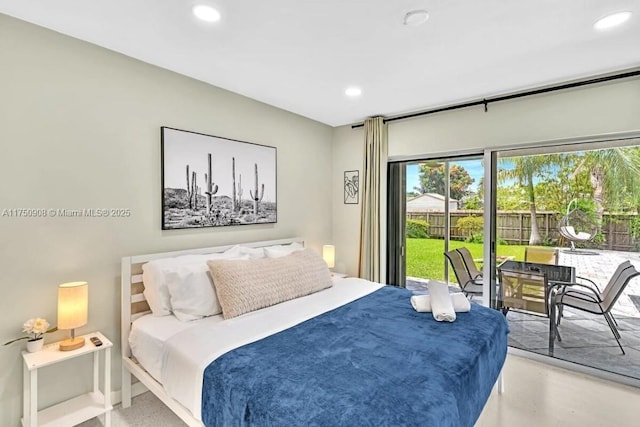 bedroom featuring concrete flooring, access to outside, and recessed lighting