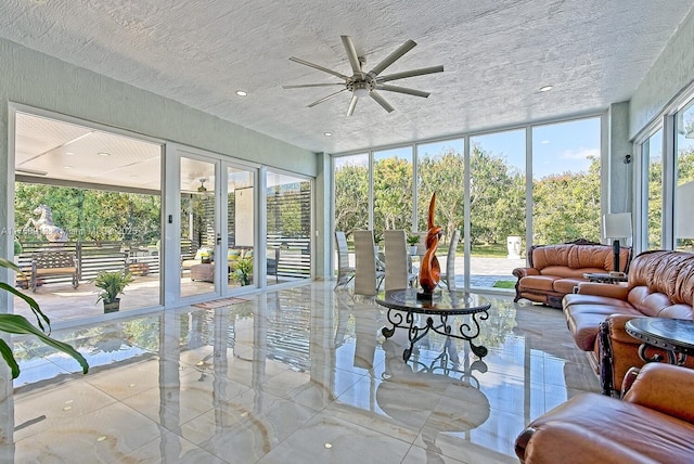 sunroom with ceiling fan