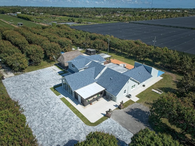 bird's eye view with a forest view