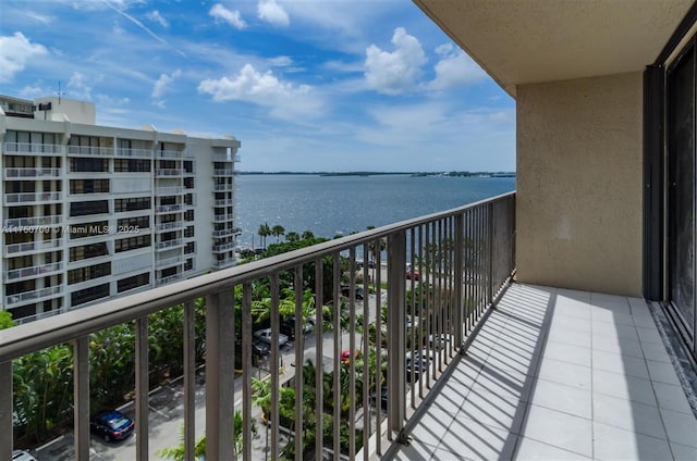 balcony featuring a water view