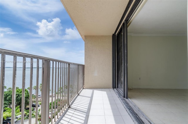 balcony featuring a water view