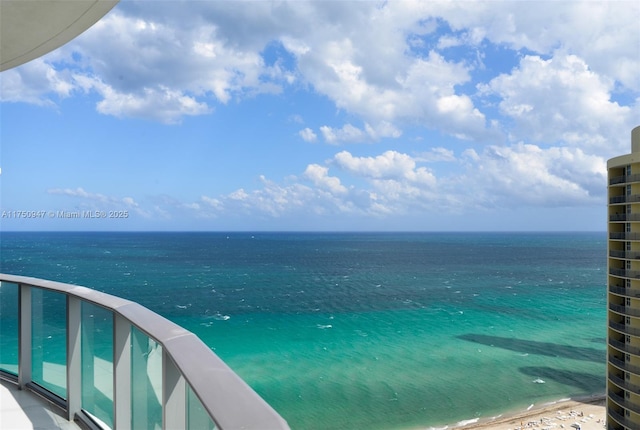 view of water feature with a beach view