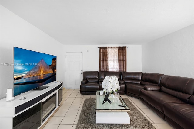 living area featuring light tile patterned flooring