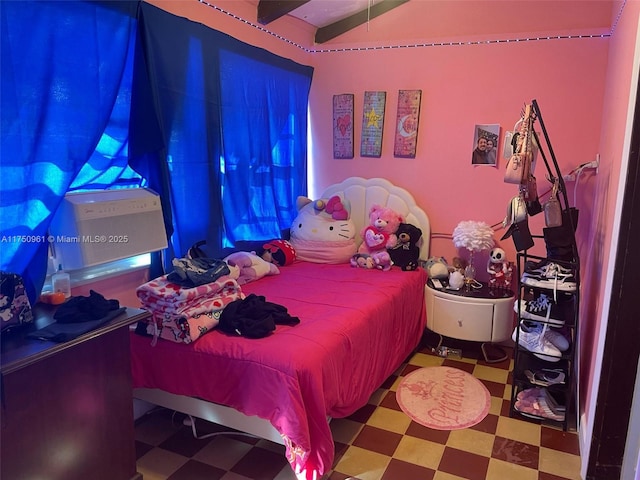 bedroom featuring vaulted ceiling and tile patterned floors