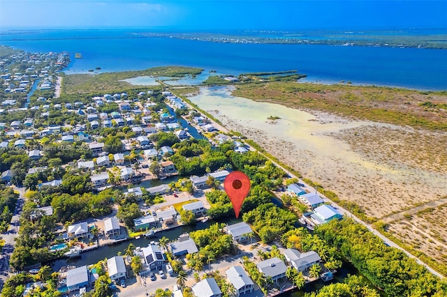 aerial view with a water view and a residential view