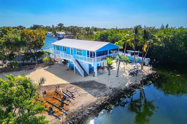 exterior space with a water view