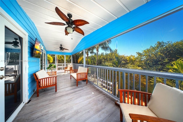 sunroom with lofted ceiling