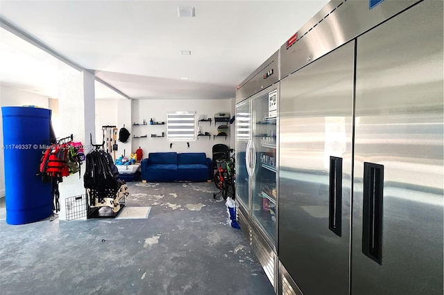 garage featuring stainless steel built in refrigerator