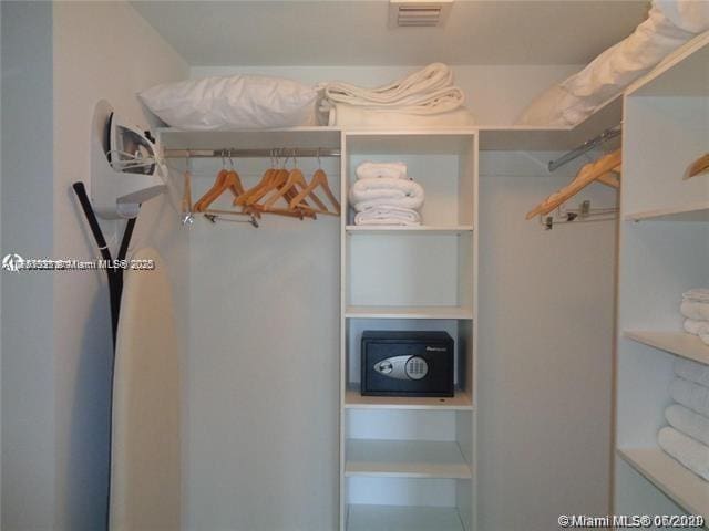 walk in closet featuring visible vents