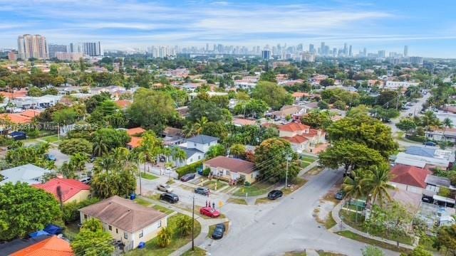 birds eye view of property featuring a view of city