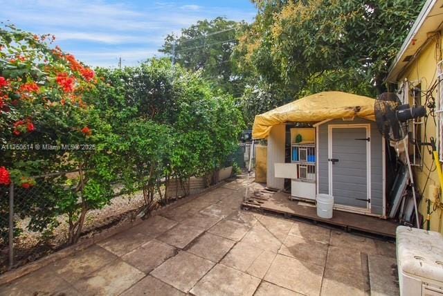 view of patio featuring fence