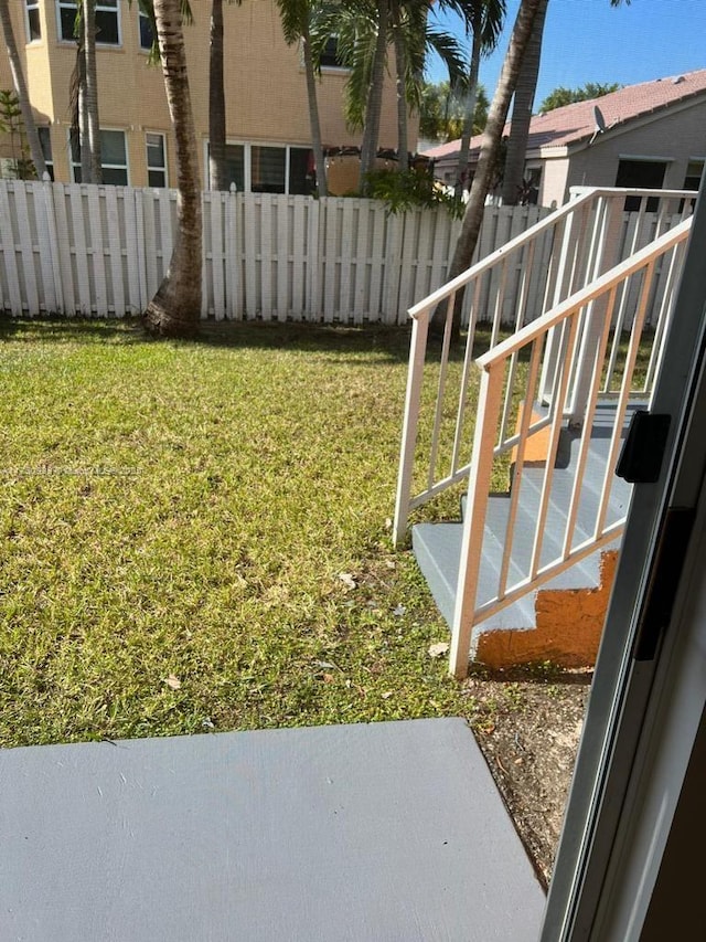 view of yard with fence