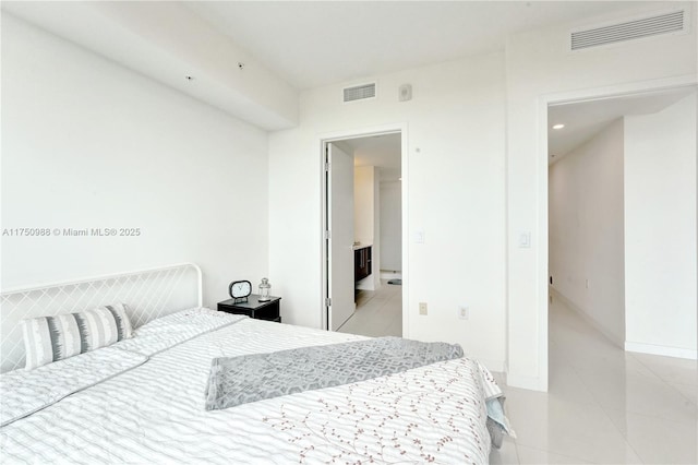 7875 NW 107th Ave Unit 518, Doral, FL 33178 - bedroom featuring recessed lighting, light tile patterned floors, baseboards, and visible vents