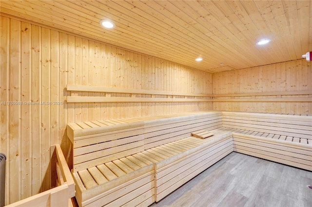 view of sauna featuring wood finished floors and recessed lighting