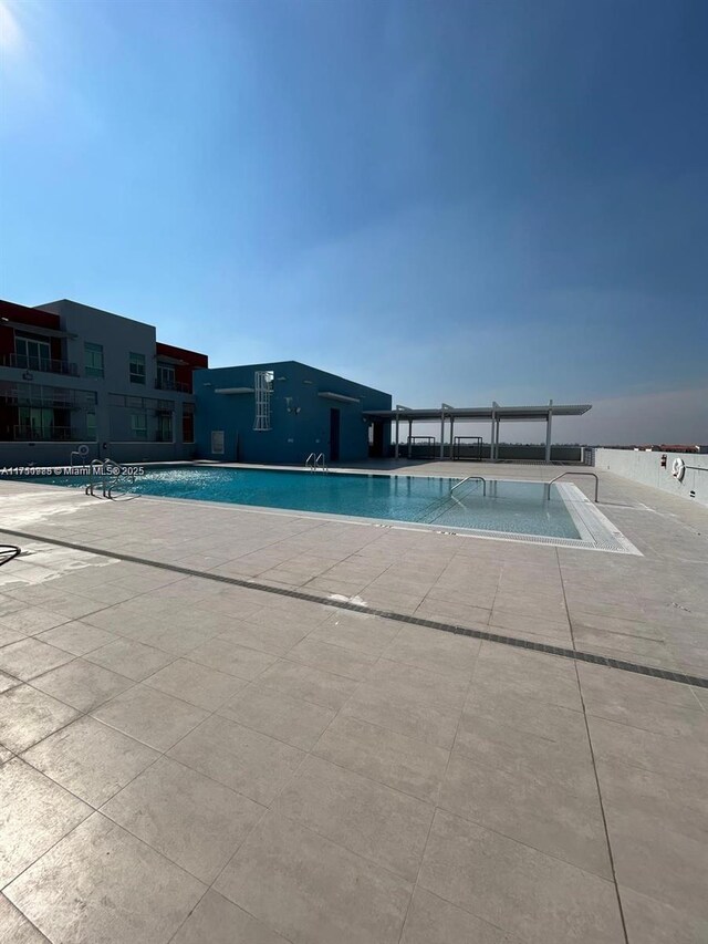 7875 NW 107th Ave Unit 518, Doral, FL 33178 - pool with a patio
