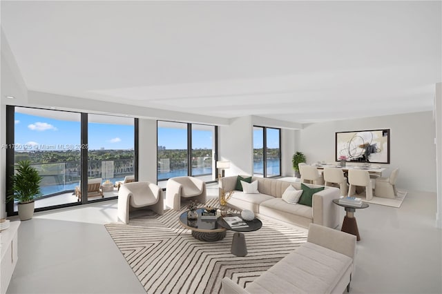 5500 Collins Ave Unit 802, Miami Beach, FL 33140 - living room featuring a water view