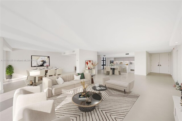 5500 Collins Ave Unit 802, Miami Beach, FL 33140 - living room with concrete floors