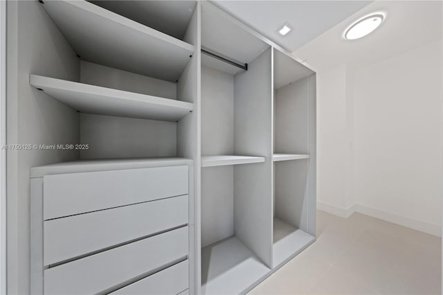 5500 Collins Ave Unit 802, Miami Beach, FL 33140 - spacious closet featuring light tile patterned floors