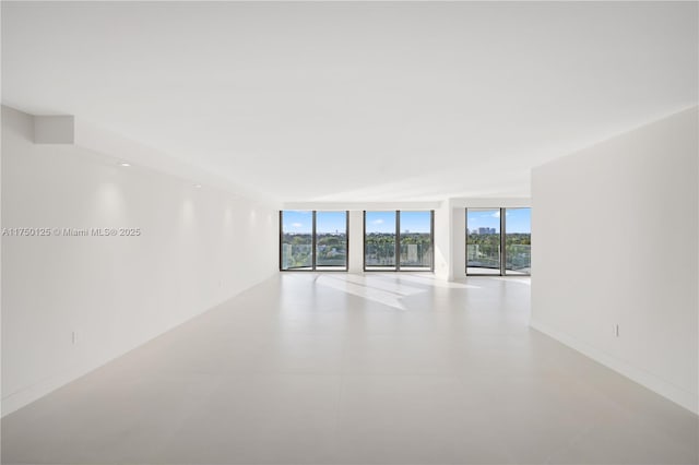 5500 Collins Ave Unit 802, Miami Beach, FL 33140 - spare room with expansive windows