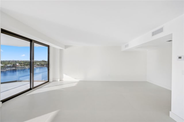 5500 Collins Ave Unit 802, Miami Beach, FL 33140 - unfurnished room with visible vents and baseboards