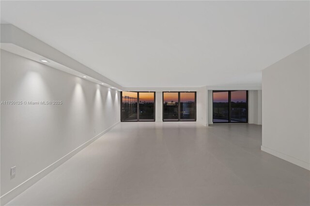 5500 Collins Ave Unit 802, Miami Beach, FL 33140 - empty room featuring recessed lighting, baseboards, and concrete floors