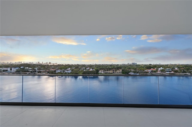 5500 Collins Ave Unit 802, Miami Beach, FL 33140 - pool at dusk with a water view and a city view