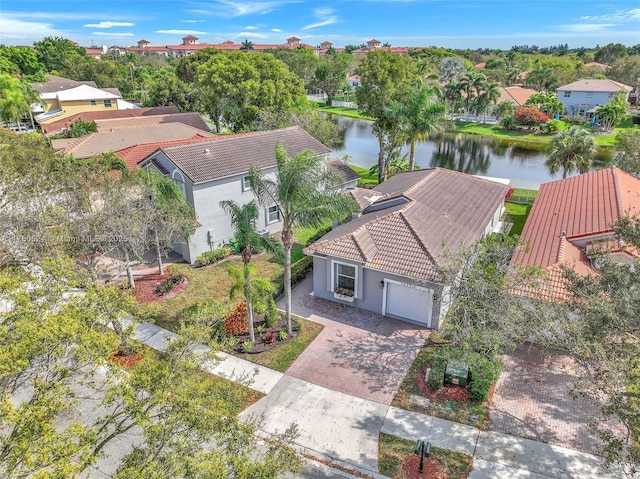 aerial view featuring a water view and a residential view