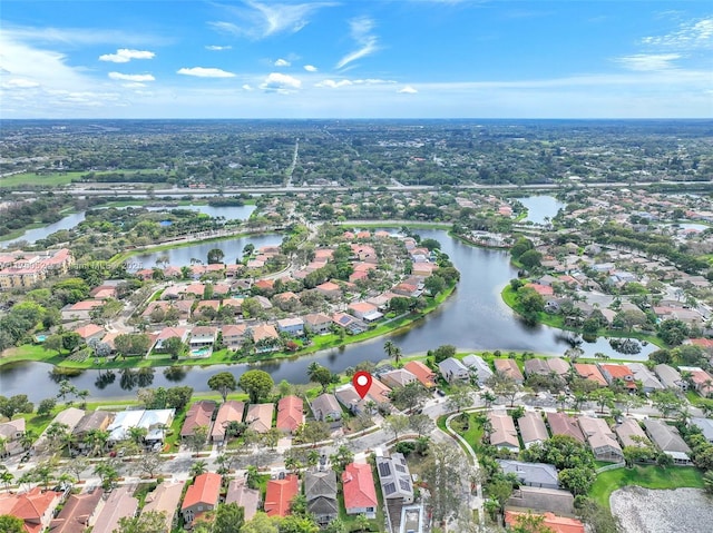 aerial view featuring a water view and a residential view