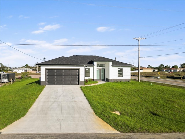 view of front of property featuring roof with shingles, stucco siding, a garage, driveway, and a front lawn