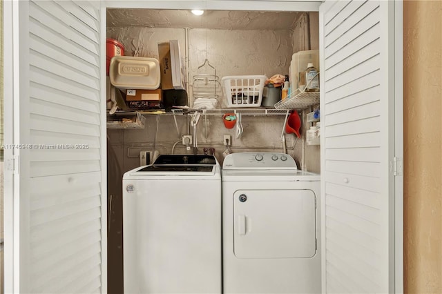 laundry area with laundry area and separate washer and dryer