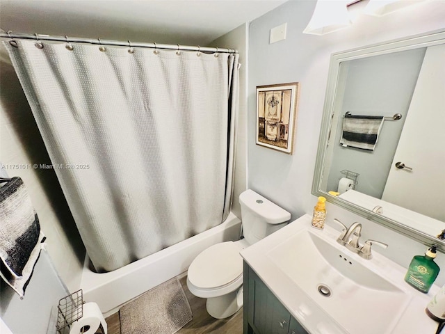 full bath featuring toilet, shower / bathtub combination with curtain, wood finished floors, and vanity