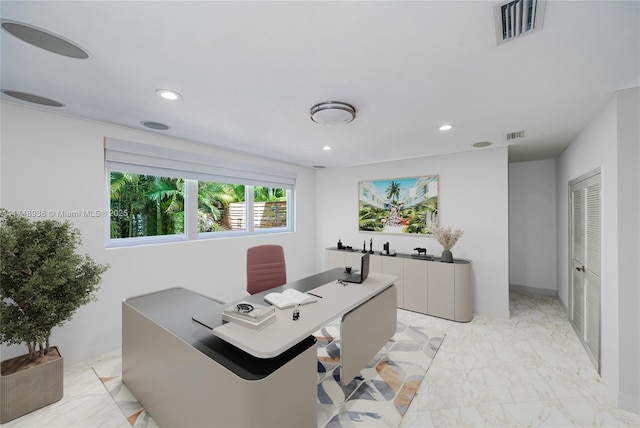 office featuring visible vents, recessed lighting, and marble finish floor