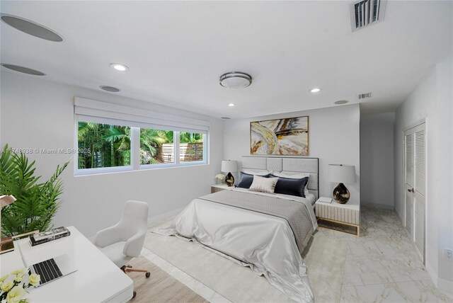 bedroom with marble finish floor, recessed lighting, and visible vents
