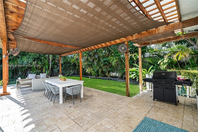view of patio / terrace with outdoor dining area and a grill