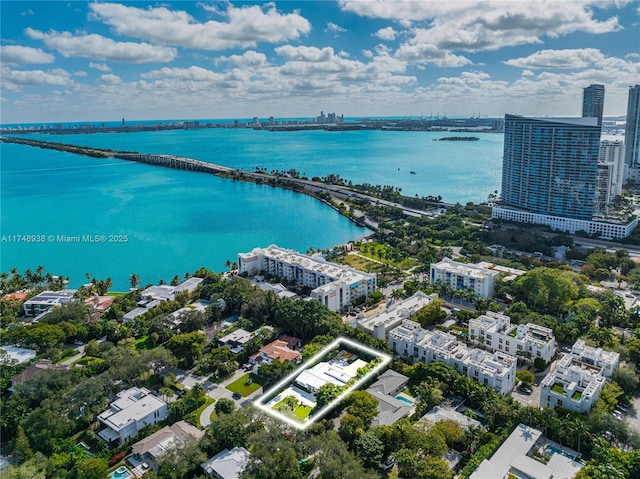 bird's eye view with a water view