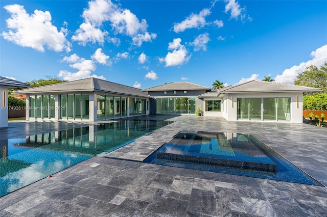 pool with a patio