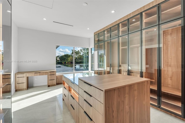 walk in closet featuring built in desk