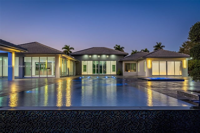 outdoor pool featuring a patio area