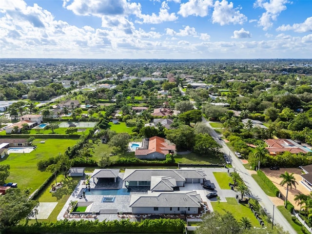 birds eye view of property with a residential view