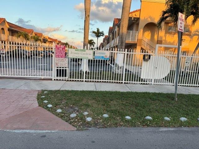 gate at dusk with fence