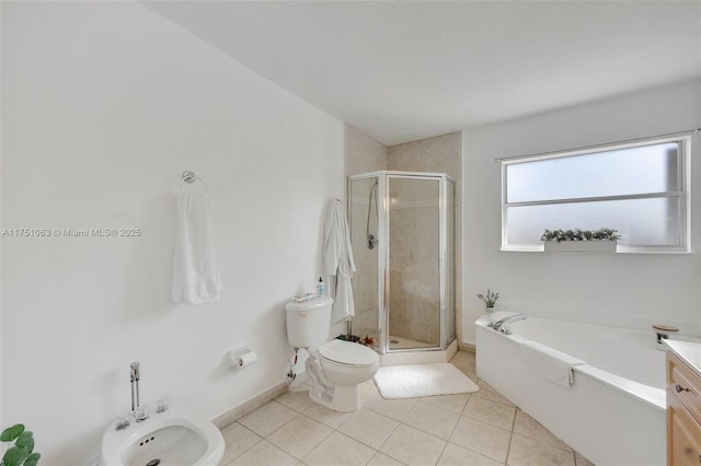 full bath with toilet, a stall shower, tile patterned flooring, and a bidet