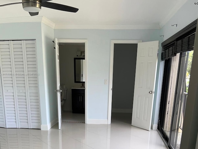 unfurnished bedroom with light tile patterned floors, ceiling fan, connected bathroom, baseboards, and ornamental molding