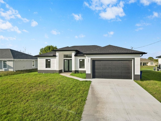 prairie-style home with a garage, concrete driveway, roof with shingles, stucco siding, and a front yard