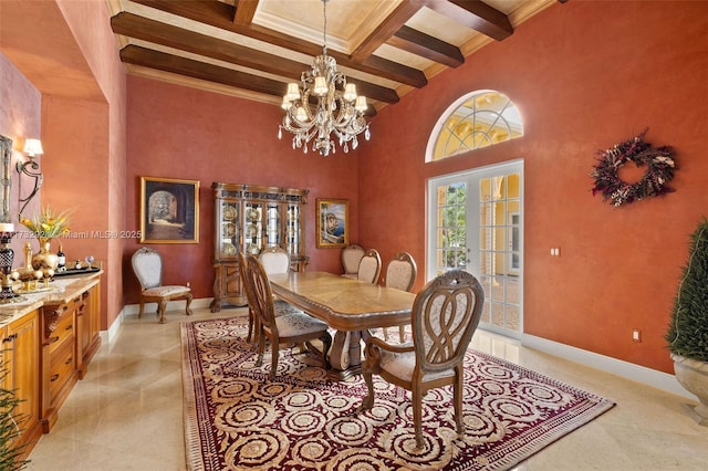 dining room with beam ceiling, french doors, a towering ceiling, coffered ceiling, and baseboards