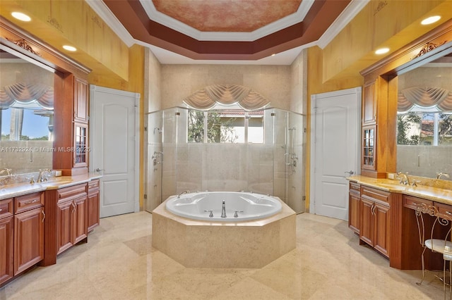 full bath featuring plenty of natural light, a shower stall, and a sink