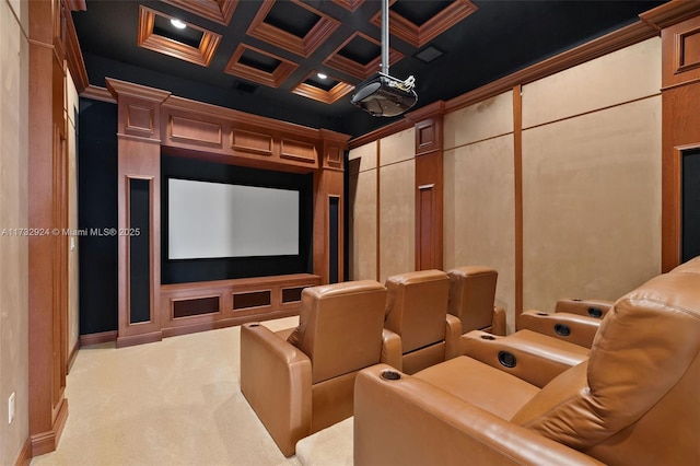 home theater room featuring ornamental molding, coffered ceiling, and light colored carpet