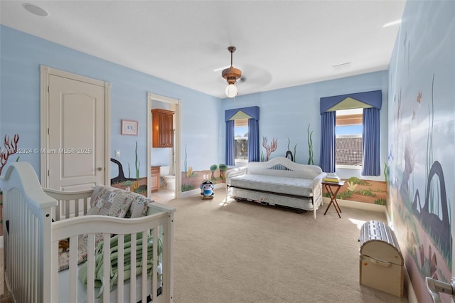 bedroom with carpet and a ceiling fan