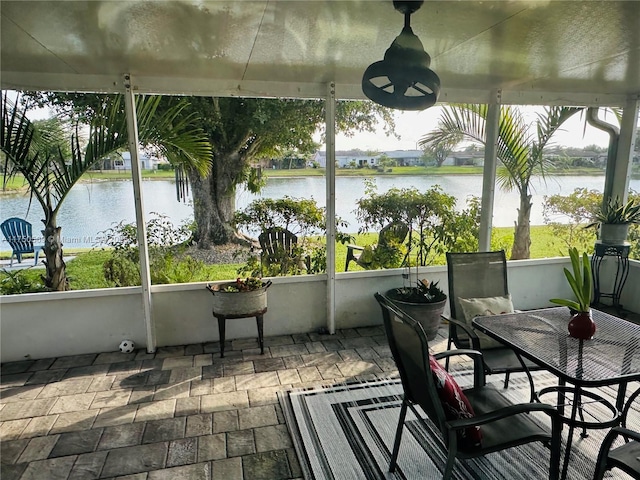 sunroom with a water view