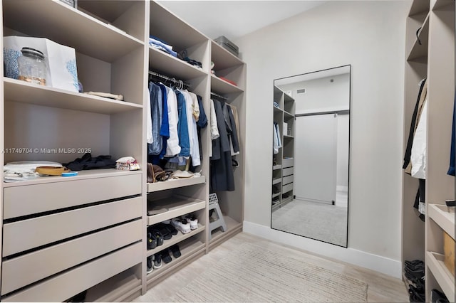 2000 Island Blvd Unit 3010, Aventura, FL 33160 - walk in closet featuring light wood-style floors