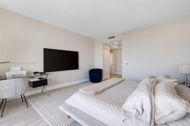 2000 Island Blvd Unit 3010, Aventura, FL 33160 - bedroom with light wood-style flooring and baseboards